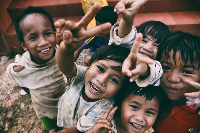 Smiling children living in poverty.